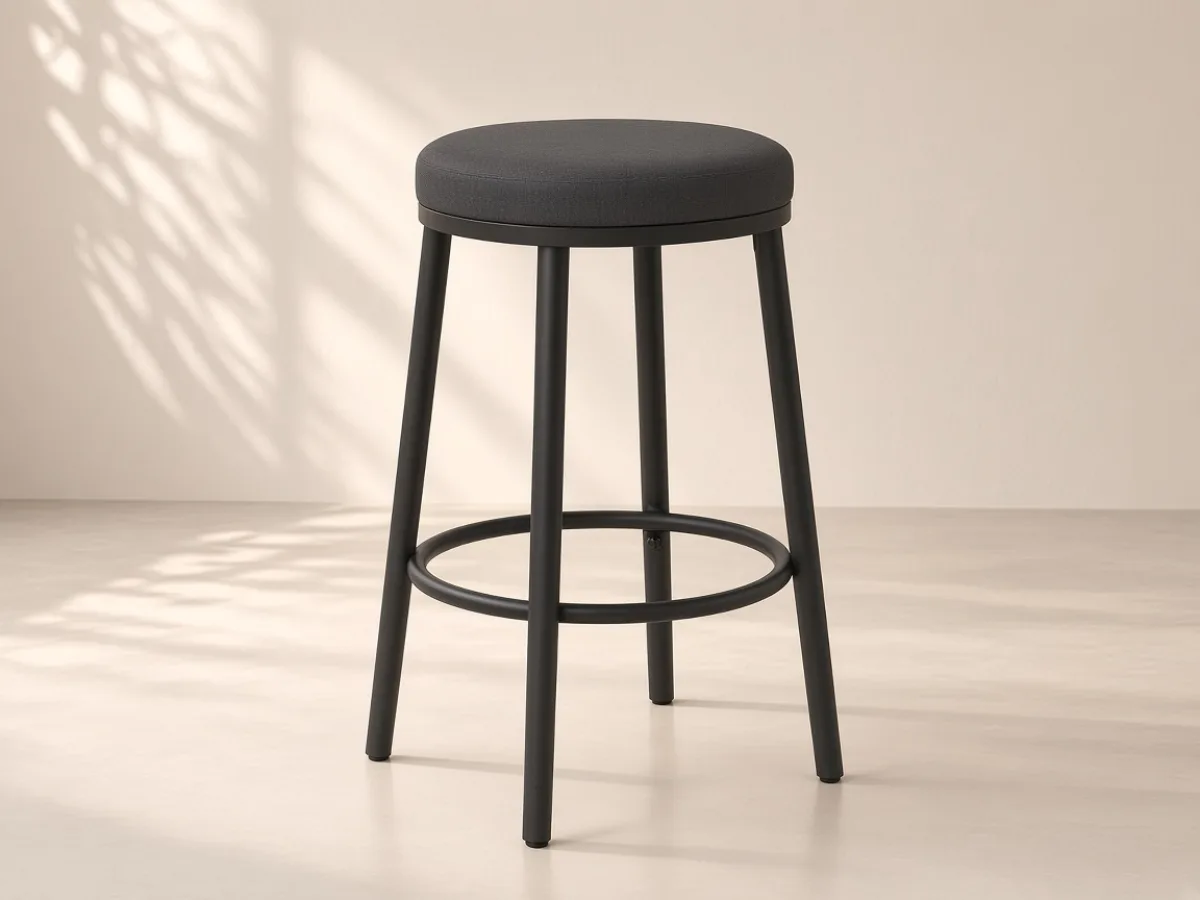Bar stool — Upholstered seat, four steel legs and a circular footrest